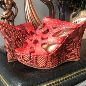 Coral snakeskin wedges
